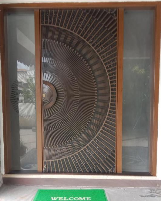 Architectural entrance door with a textured S3 Surfaces treatment