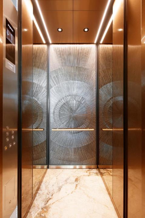 Elevator interior with textured panel — catalogue image